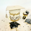 White graduation cake